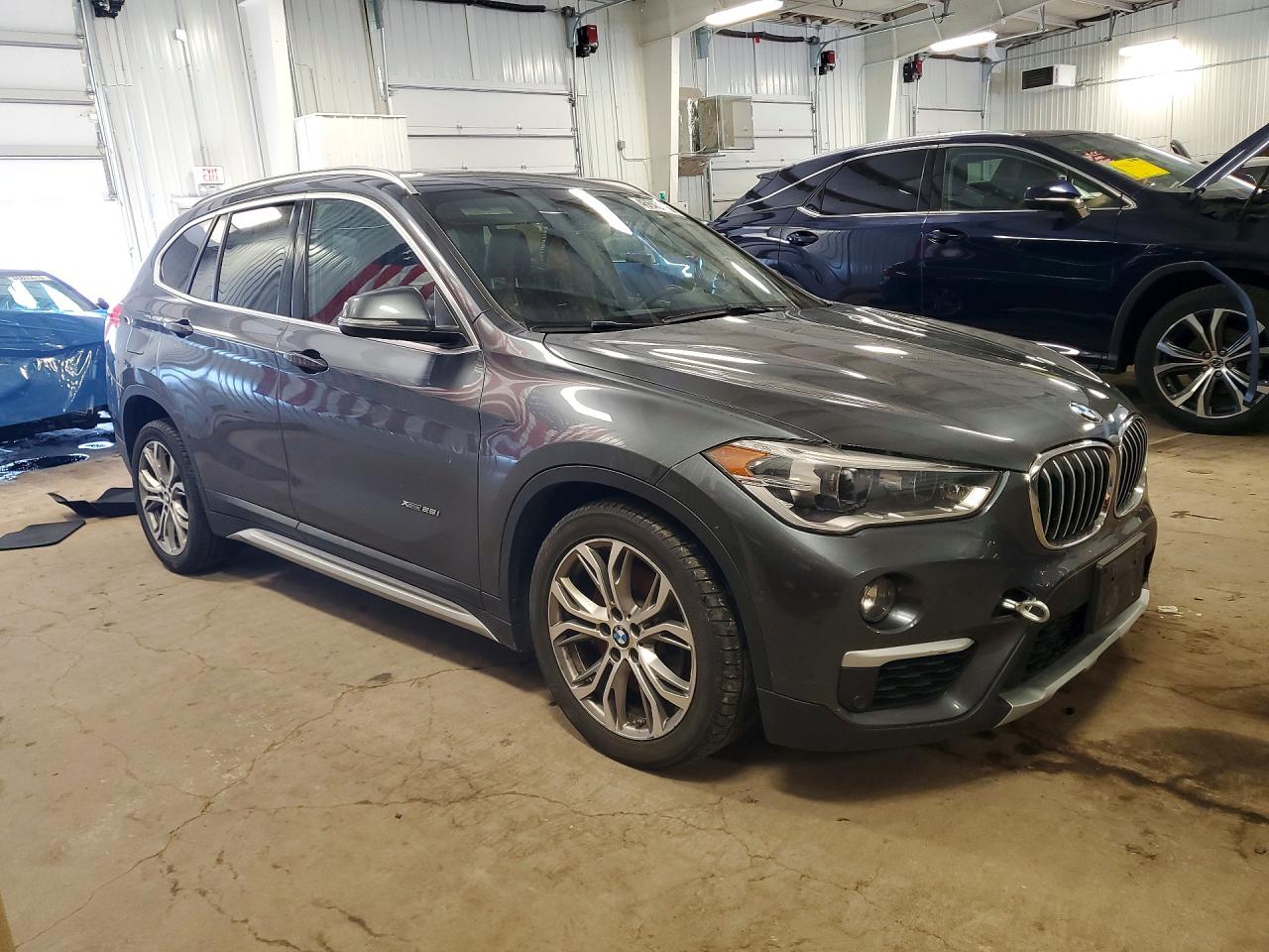 2016 BMW X1 VIN WBXHT3C30GP884589 photo 4