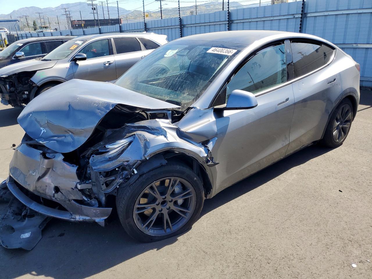 2024 Tesla Model y VIN 7SAYGDED7RF211585 photo 1