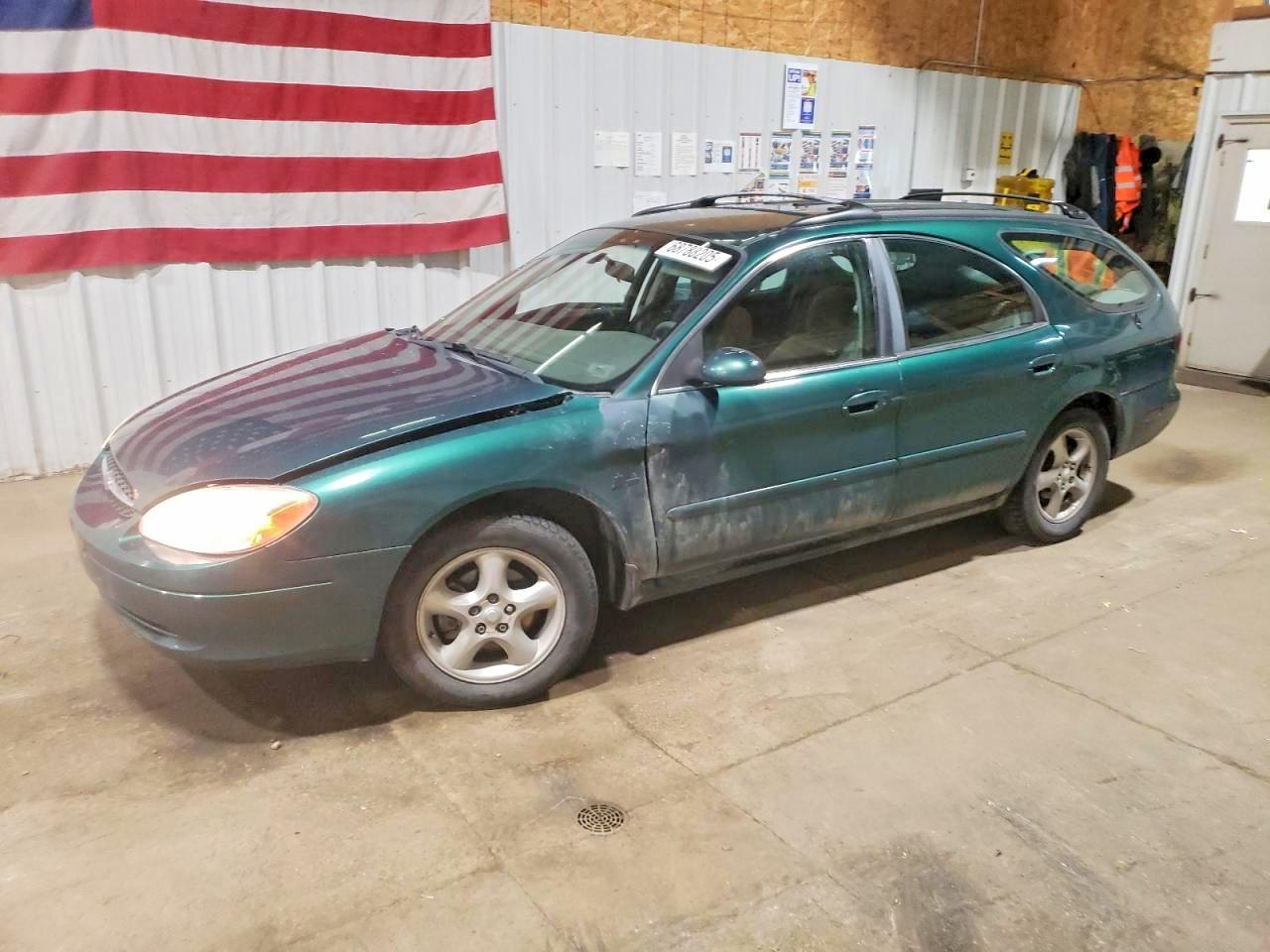 2000 Ford Taurus VIN 1FAFP5828YG225641 photo 1