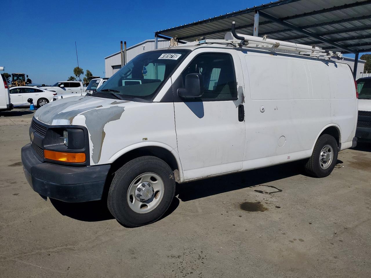 2012 CHEV Express VIN 1GCWGFCB9C1117807 photo 1
