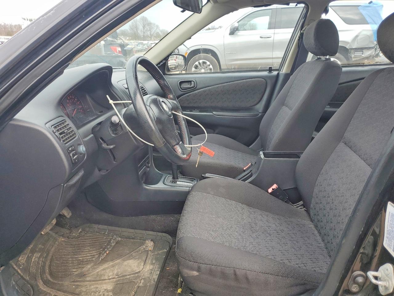 2001 Toyota Corolla VIN 1NXBR12E11Z490998 photo 7