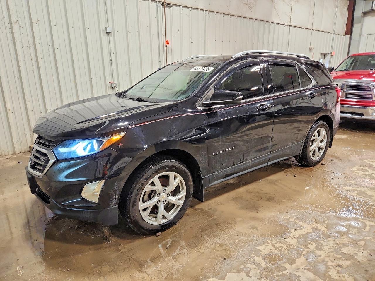 2018 Chevrolet Equinox VIN 2GNAXTEX5J6261681 photo 1