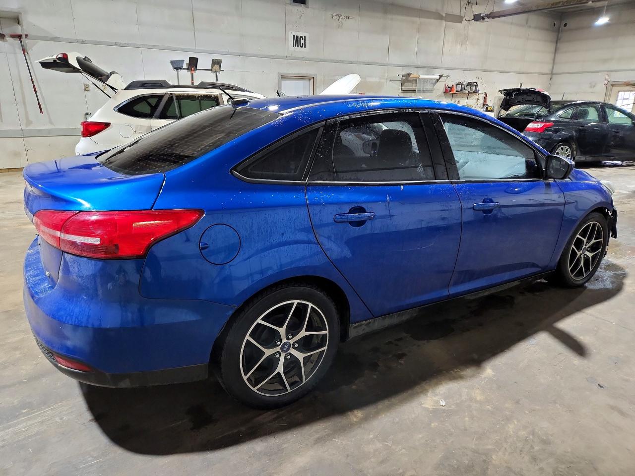 2018 Ford Focus VIN 1FADP3F2XJL310993 photo 3