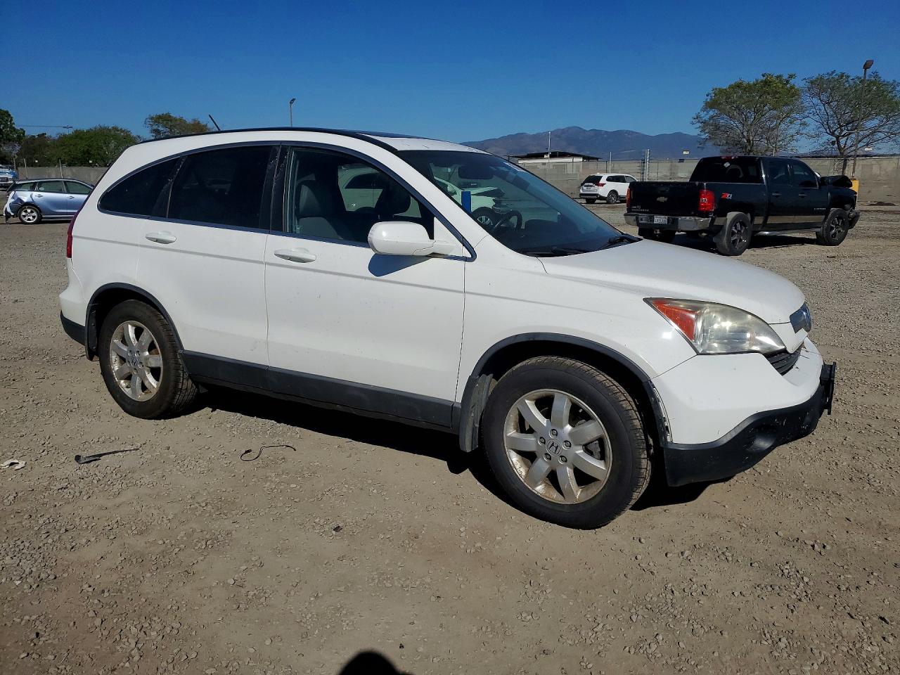 2009 Honda Crv VIN 5J6RE487X9L002958 photo 4