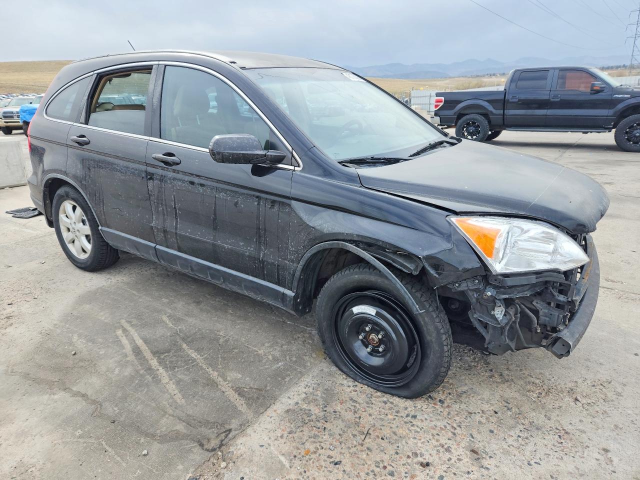 2009 Honda Crv VIN JHLRE48309C000657 photo 4