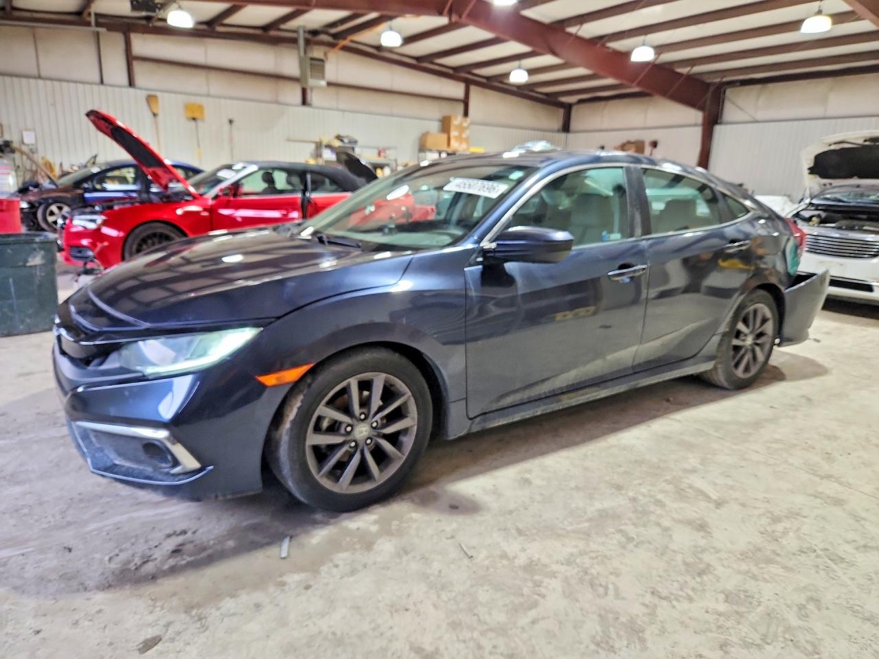 2019 Honda Civic VIN 19XFC1F30KE200847 photo 1