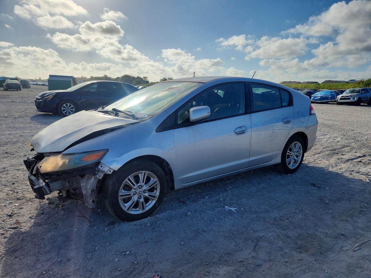 2011 Honda Insight VIN JHMZE2H79BS001658 photo 1