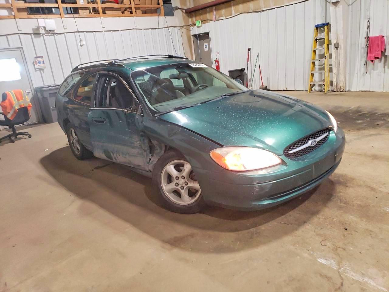2000 Ford Taurus VIN 1FAFP5828YG225641 photo 4