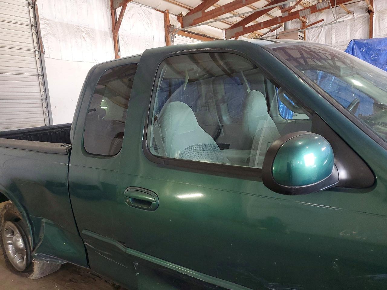 1999 Ford F150 VIN 1FTRX18L1XNA06068 photo 10