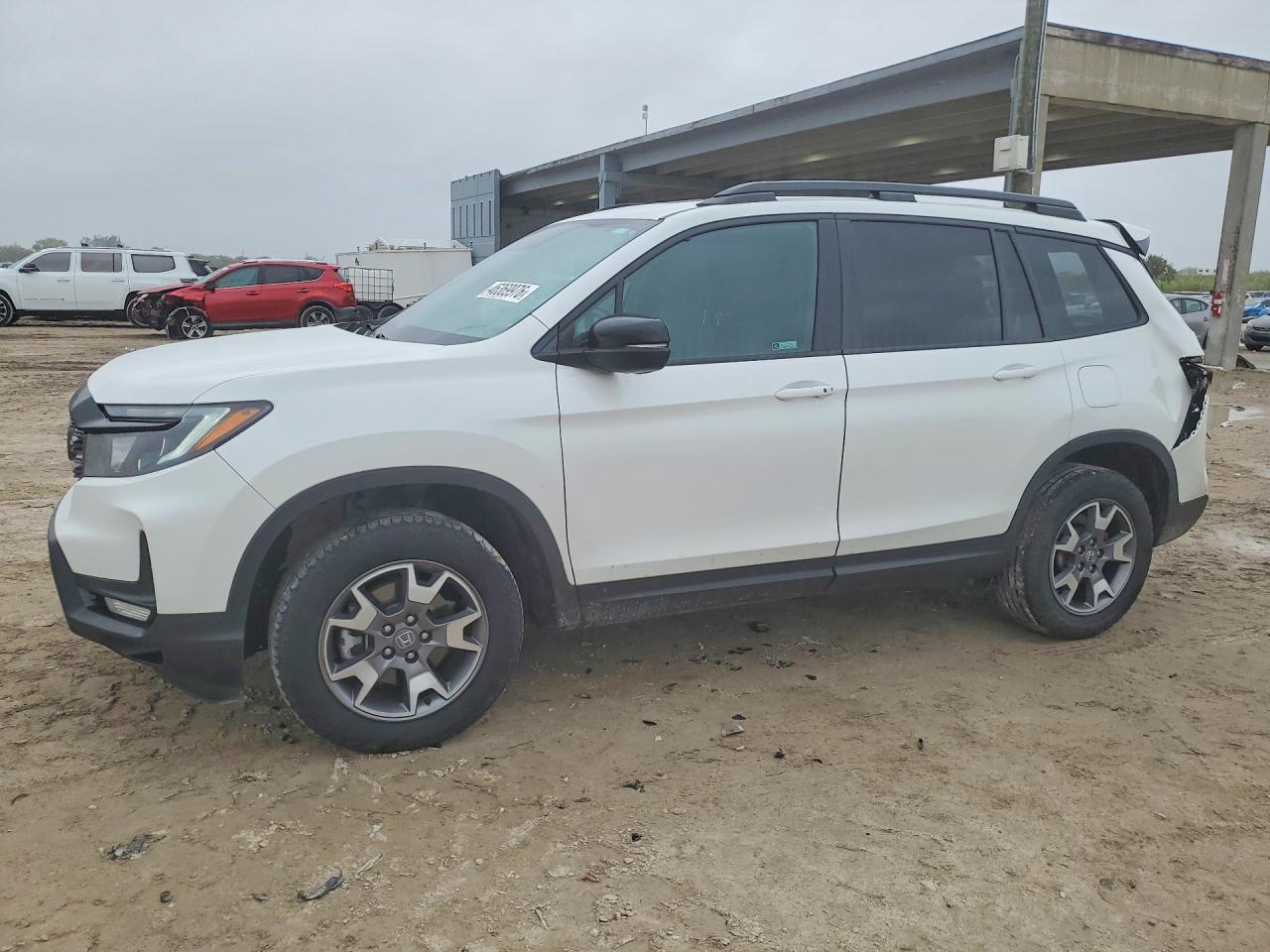 2022 Honda Passport VIN 5FNYF8H61NB017598 photo 1