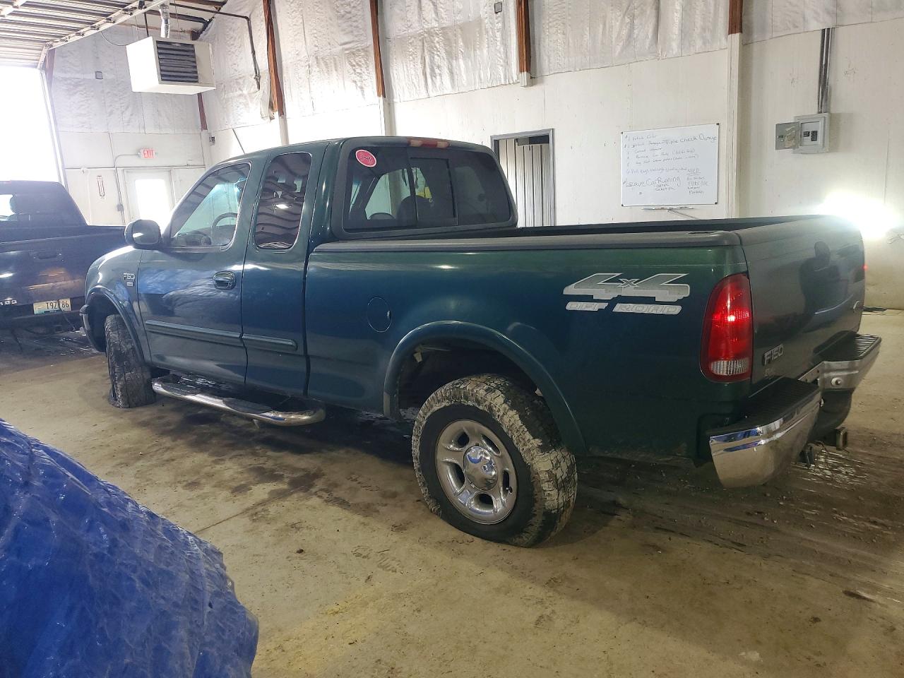 1999 Ford F150 VIN 1FTRX18L1XNA06068 photo 2
