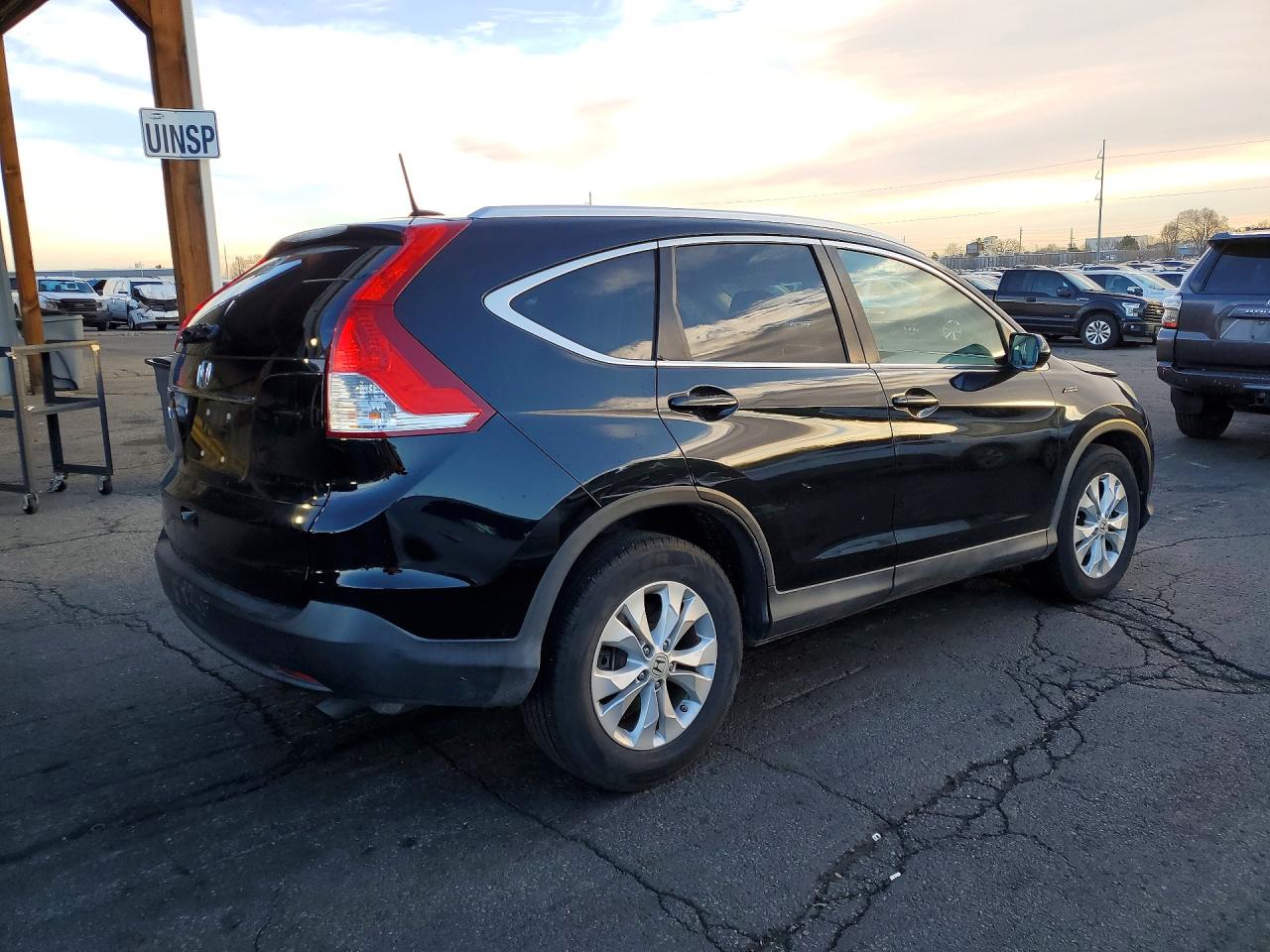 2012 Honda Crv VIN 2HKRM3H77CH506947 photo 3