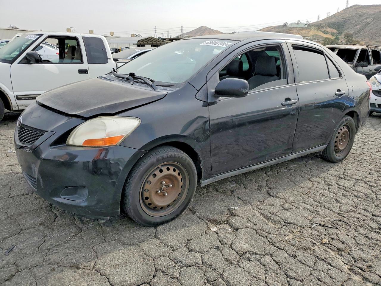 2009 TOYOTA Yaris VIN JTDBT903894055543 photo 1