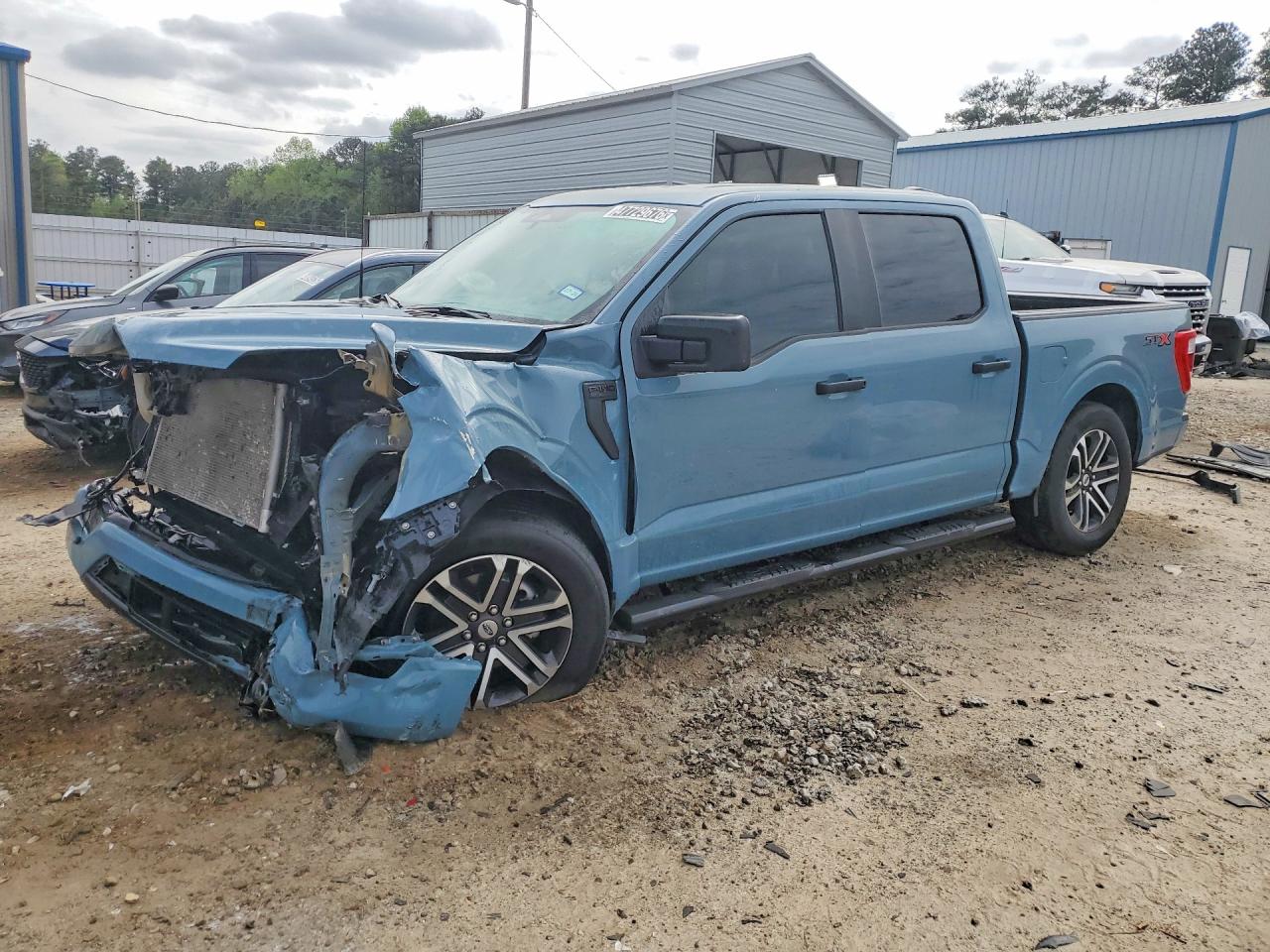 2023 Ford F150 VIN 1FTEW1CP4PKD22058 photo 1