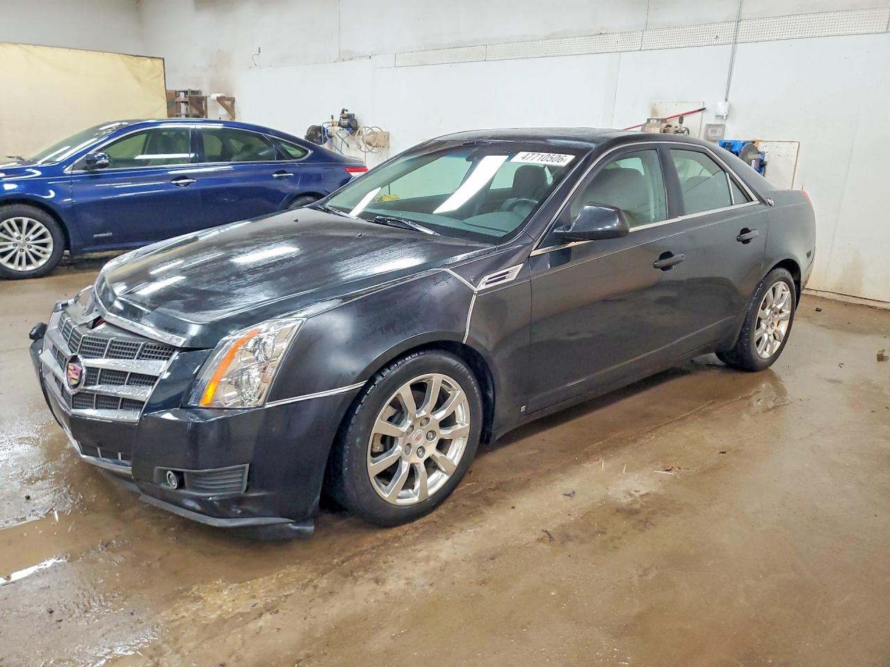 2009 Cadillac Cts VIN 1G6DG577190152690 photo 1