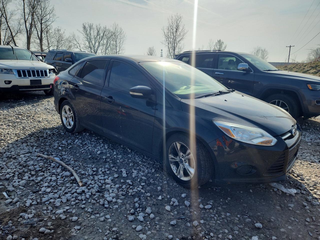 2013 Ford Focus VIN 1FADP3F25DL312378 photo 4