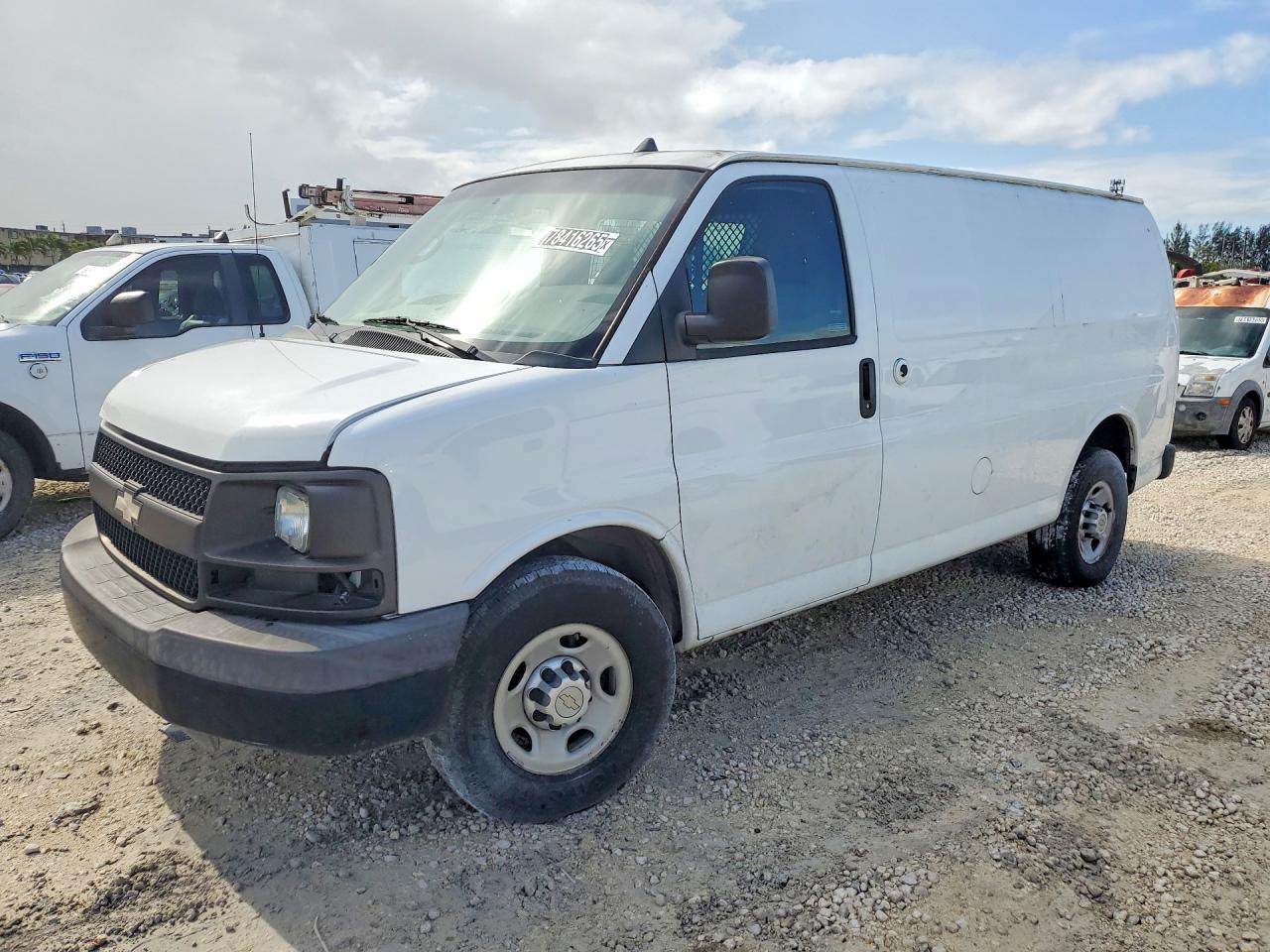 2013 CHEV Express VIN 1GCWGFCA1D1904307 photo 1