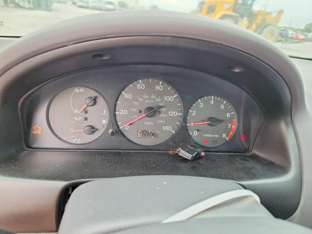 1999 Mazda Protege VIN JM1BJ2216X0183504 photo 9