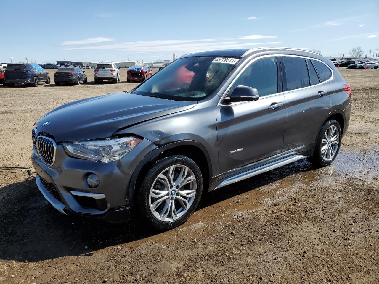 2017 BMW X1 VIN WBXHT3C37H5F75301 photo 1