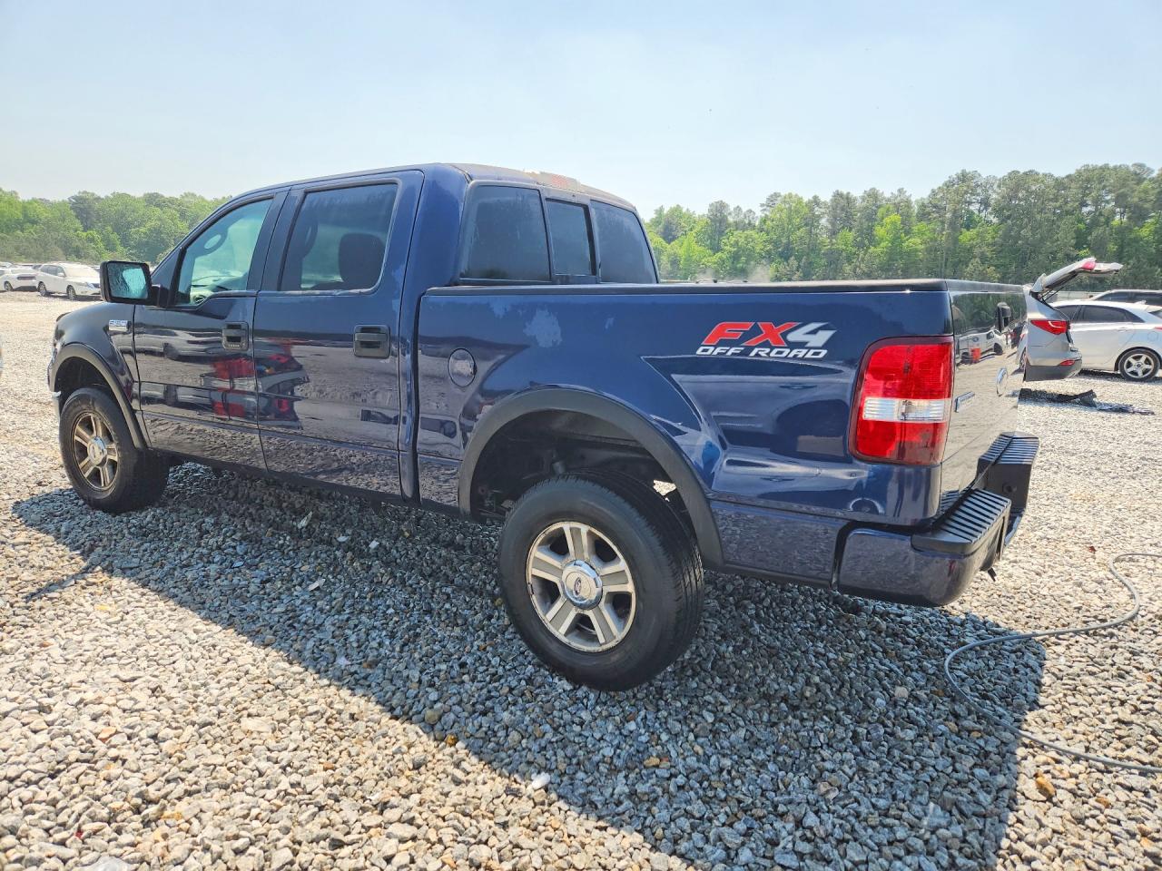 2004 Ford F150 VIN 1FTPW14554KD54986 photo 2
