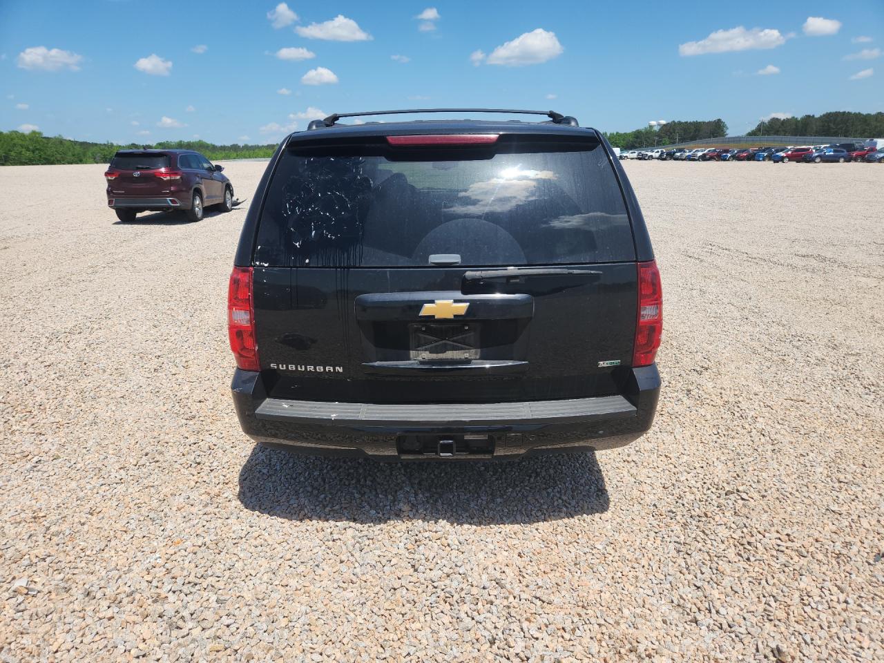 2011 Chevrolet Suburban VIN 1GNSCJE0XBR111112 photo 6