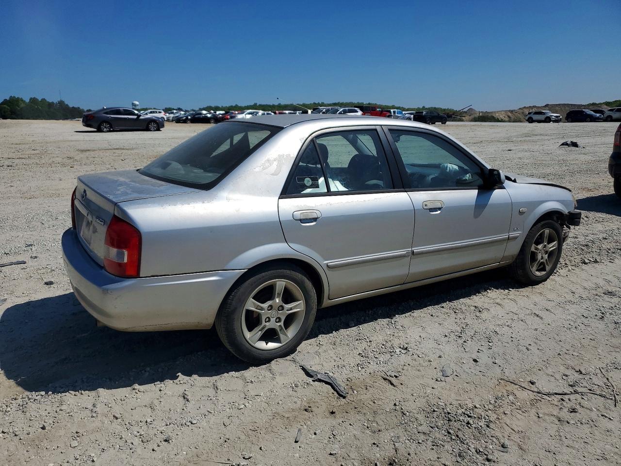 2003 Mazda Protege VIN JM1BJ225630107410 photo 3