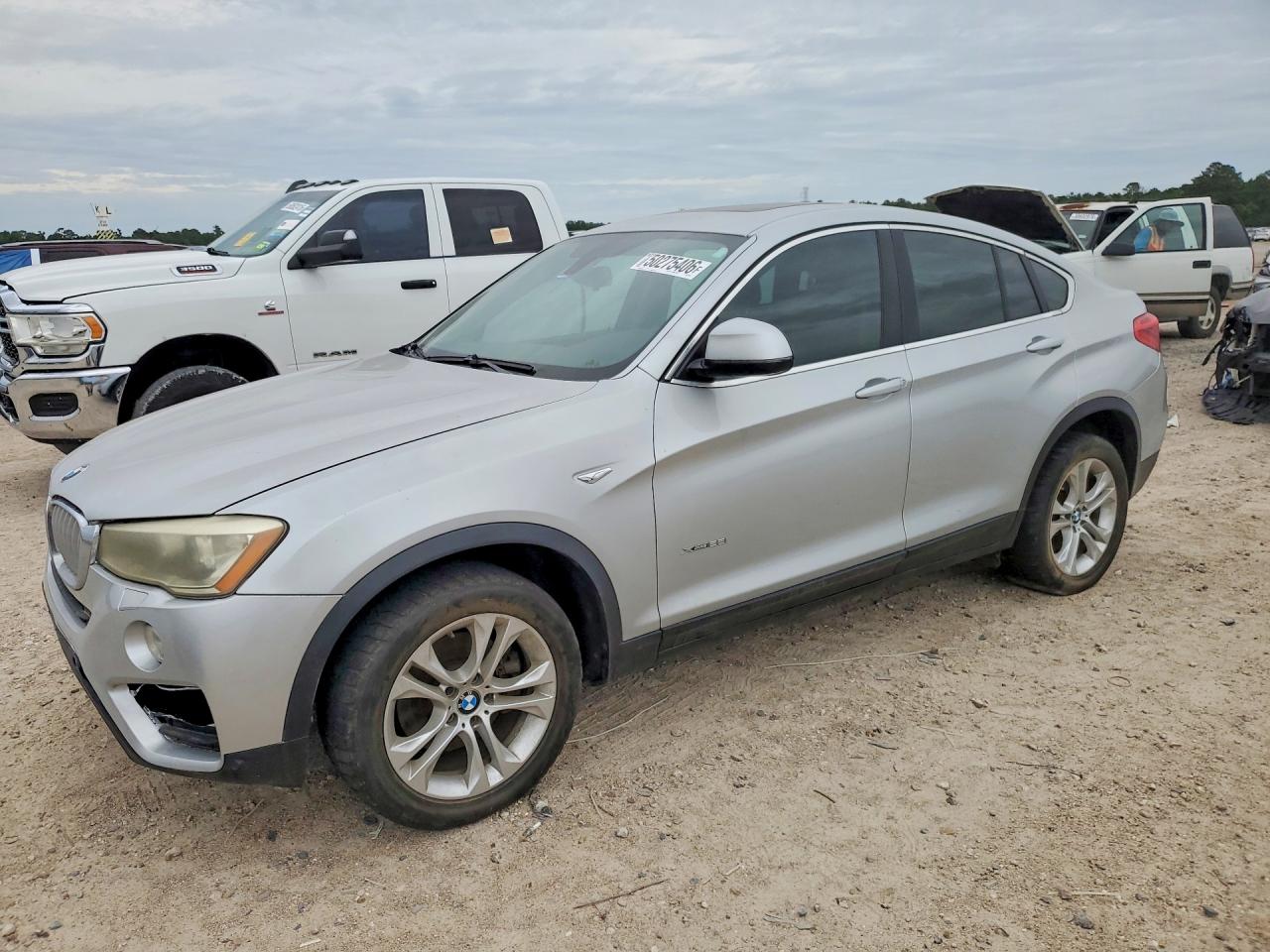 2015 BMW X4 VIN 5UXXW3C55F0M88911 photo 1