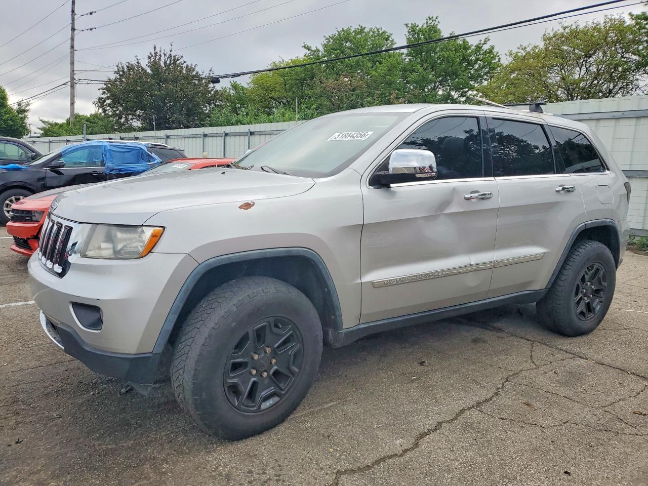 2011 Jeep Cherokee VIN 1J4RR5GG2BC619532 photo 1
