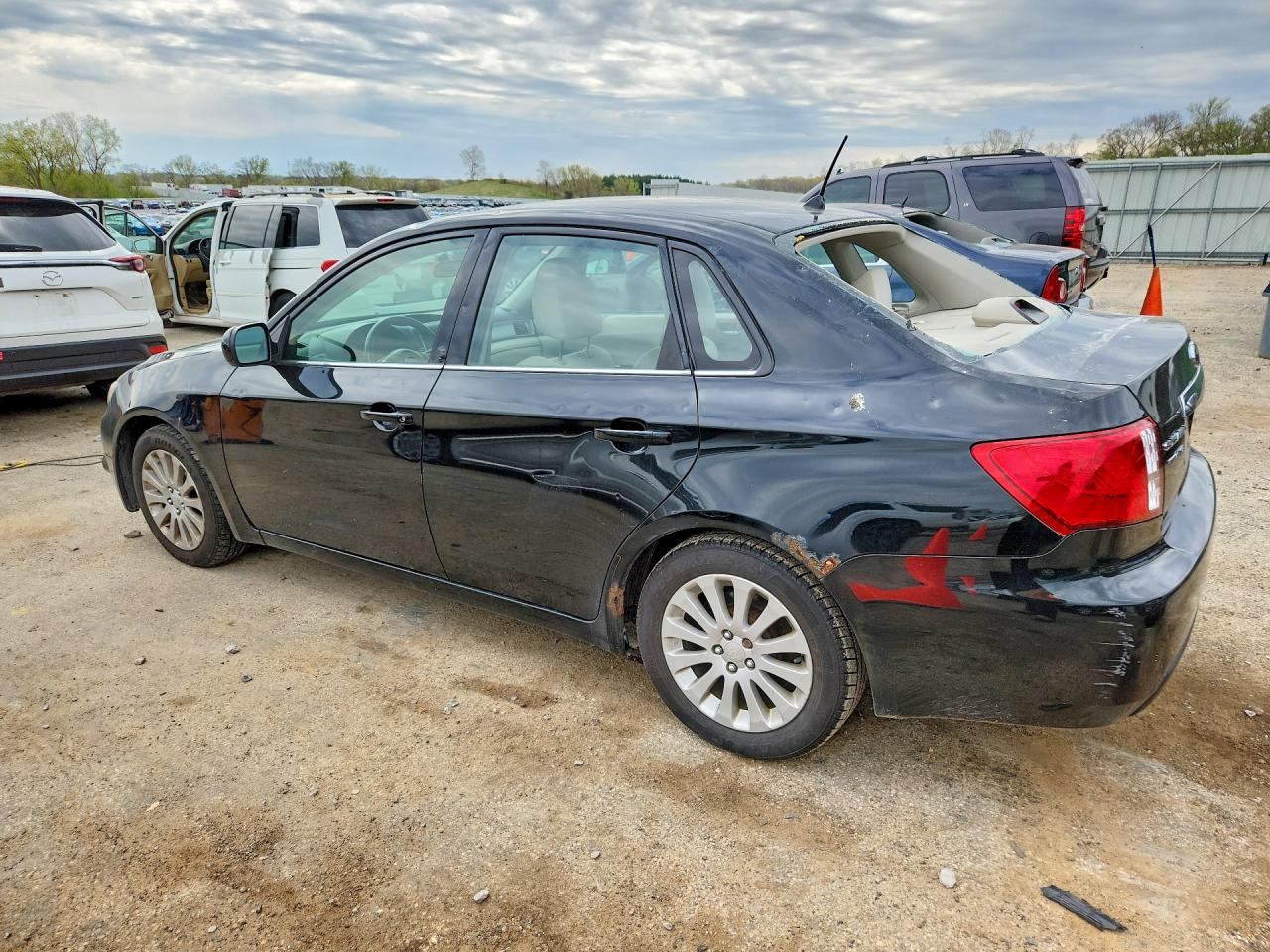 2011 Subaru Impreza VIN JF1GE6B65BH502372 photo 2