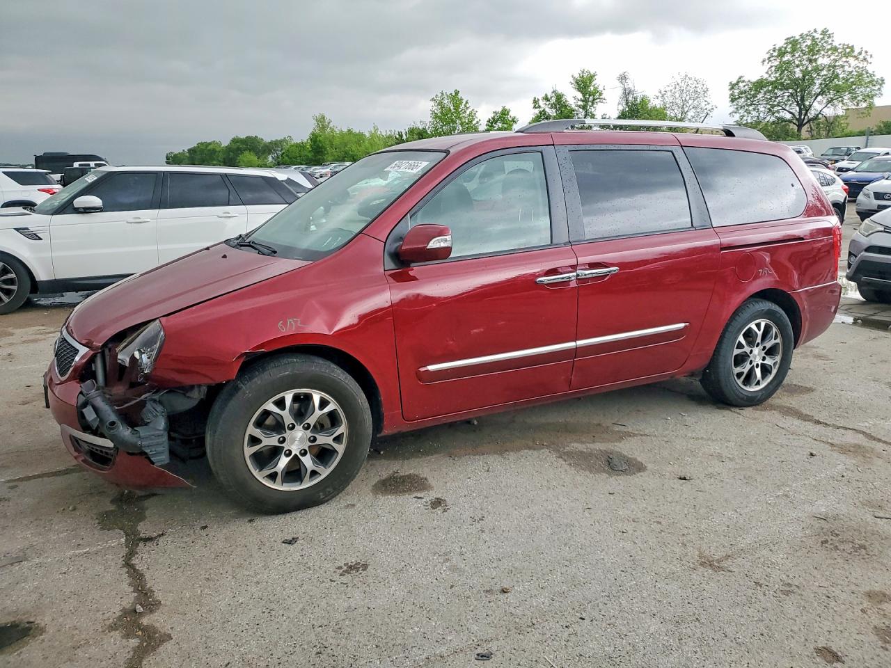 2014 Kia SEDONA VIN KNDMH4C70E6552774 photo 1