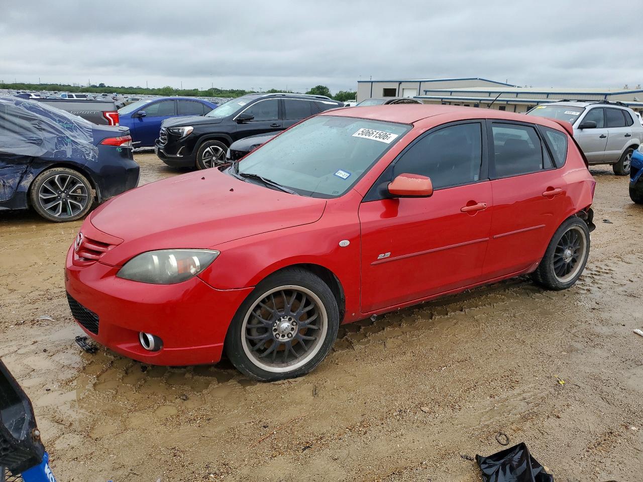 2005 Mazda Mazda3 VIN JM1BK143051327738 photo 1