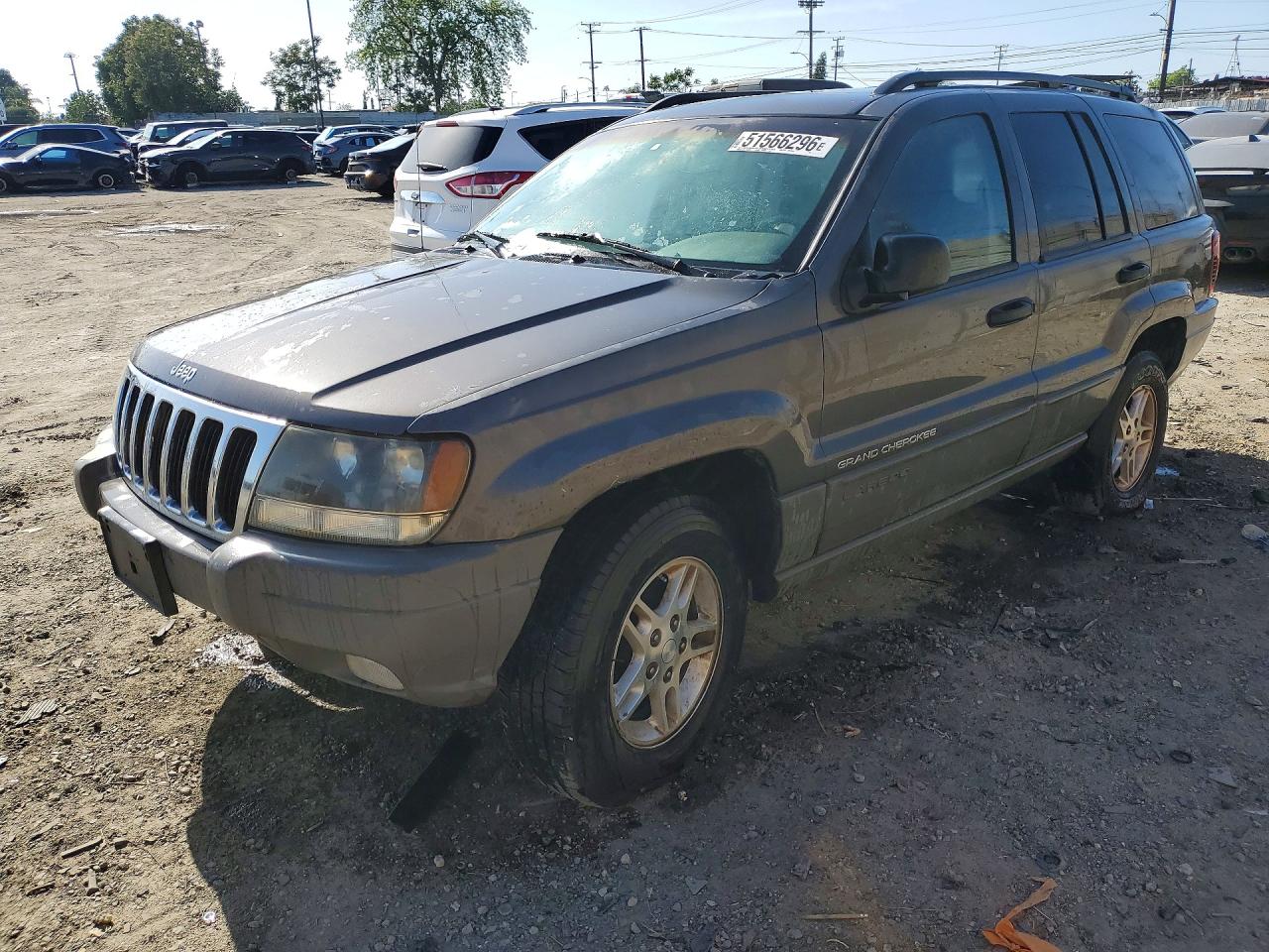 2000 Jeep Cherokee VIN 1J8GX48S02C277989 photo 1