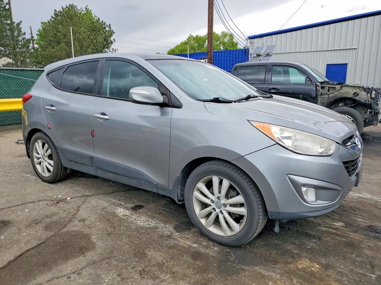 2013 Hyundai Tucson VIN KM8JUCAC6DU690592 photo 4
