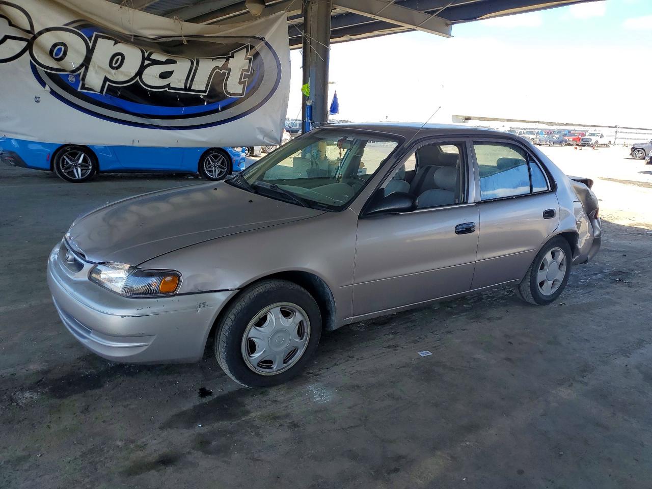 1999 Toyota Corolla VIN 1NXBR12EXXZ176808 photo 1