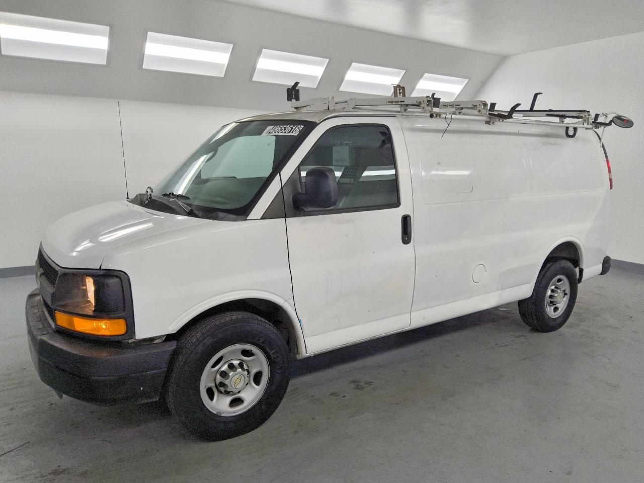 2013 CHEV Express VIN 1GCWGFCA9D1151447 photo 1