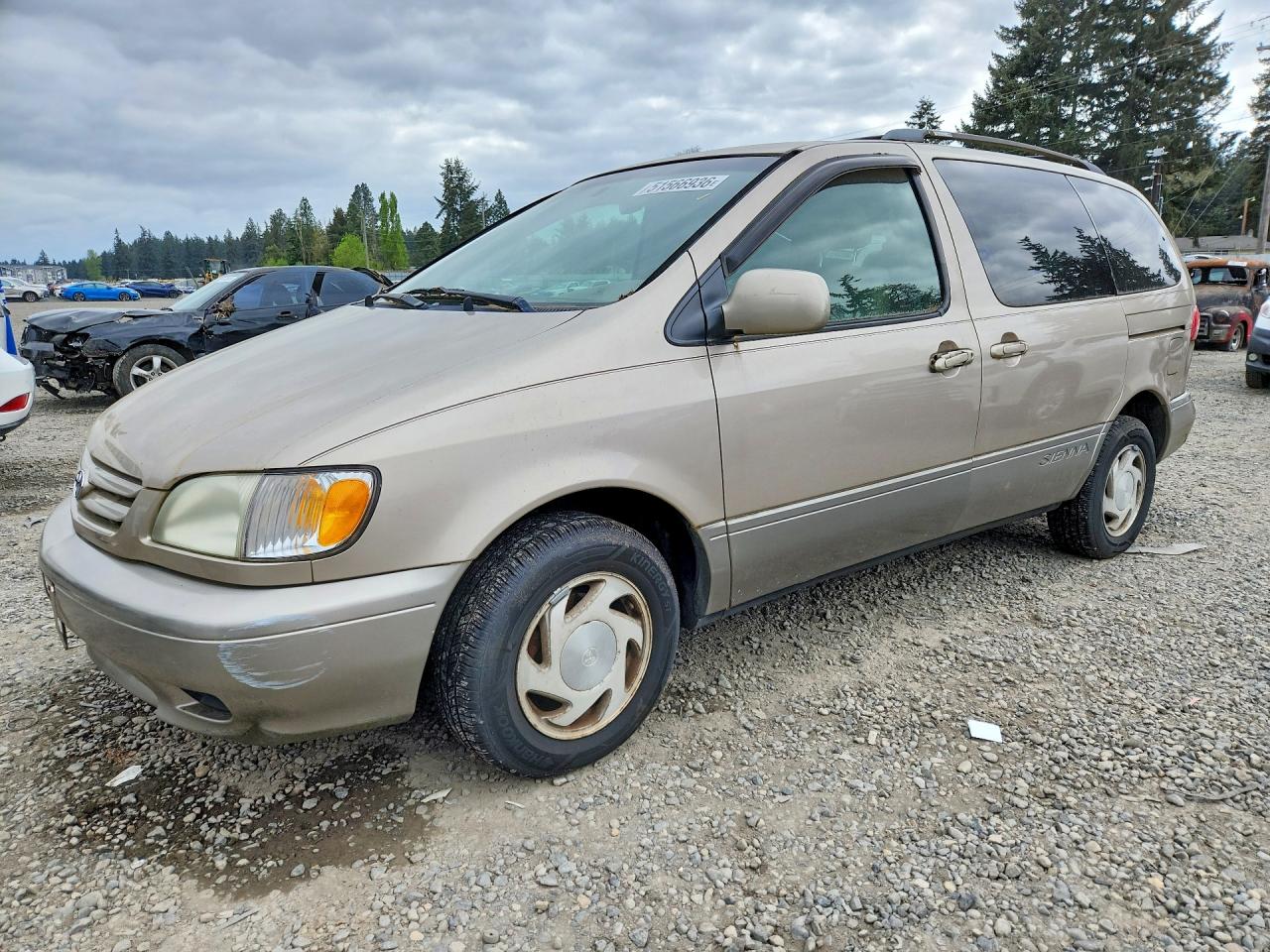 2002 Toyota Sienna VIN 4T3ZF13CX2U437925 photo 1