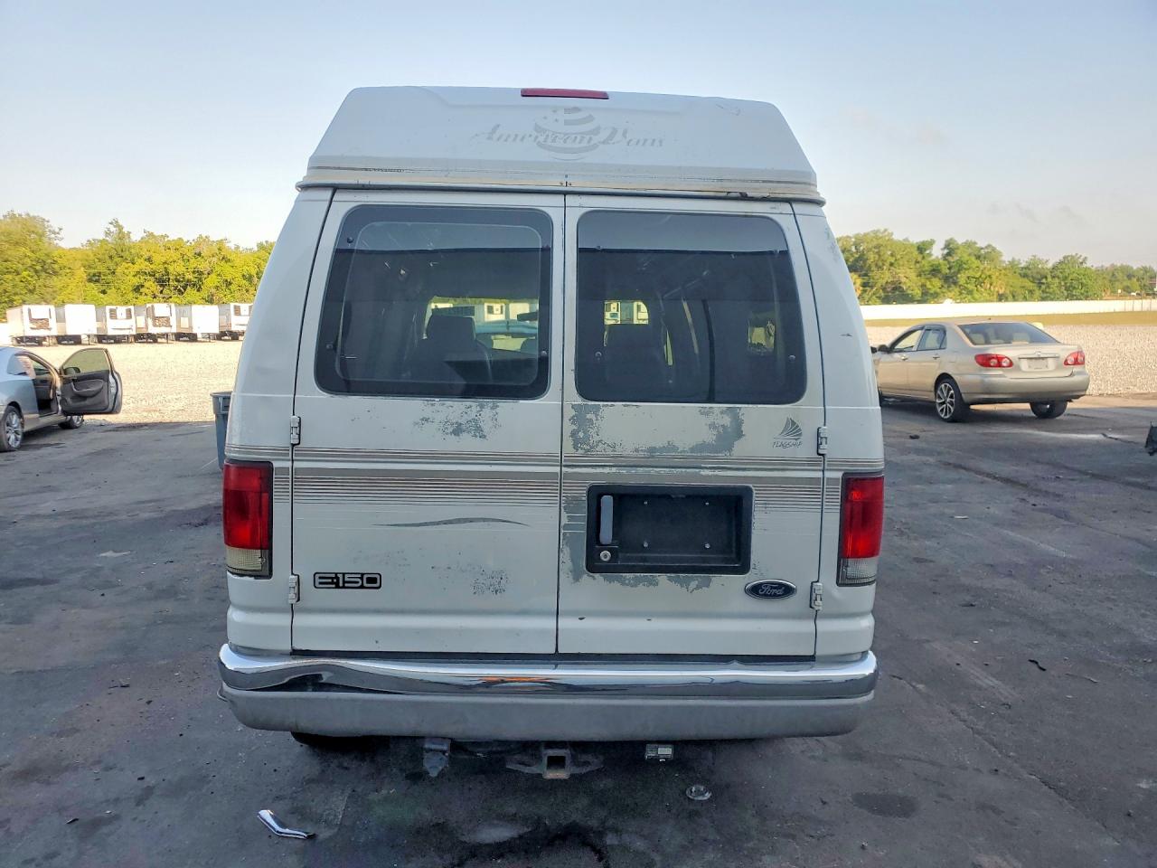 1999 Ford Econoline VIN 1FDRE14W1XHB18918 photo 6