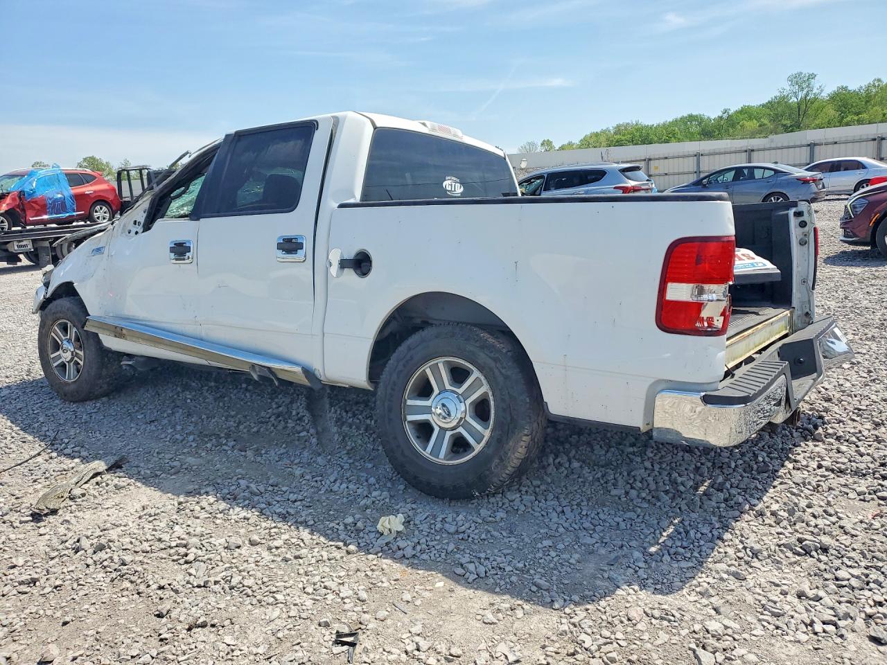 2005 Ford F150 VIN 1FTPW12565KF03457 photo 2