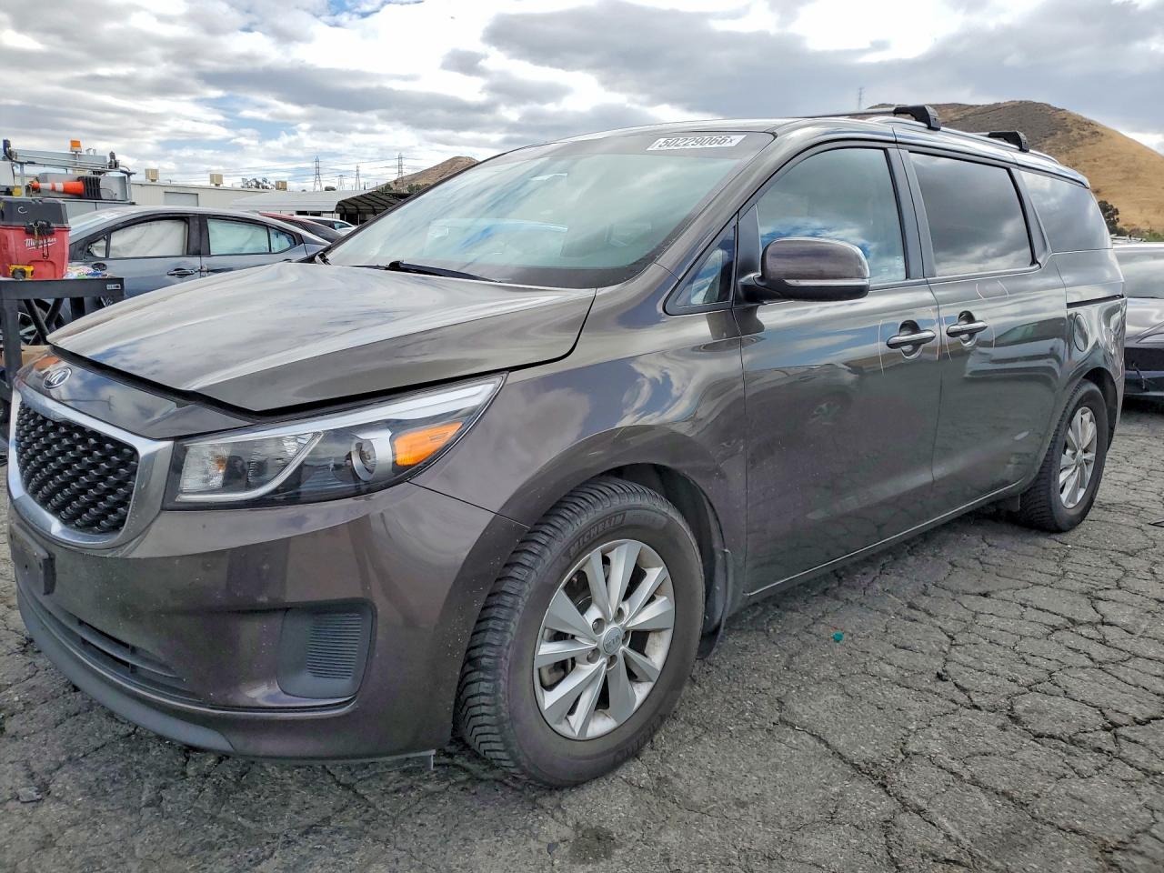 2016 Kia SEDONA VIN KNDMB5C10G6182478 photo 1