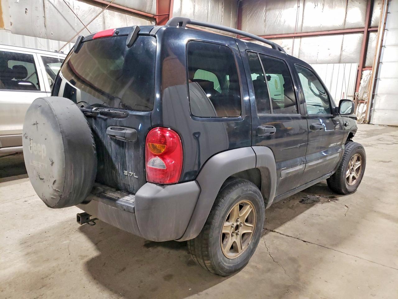 2003 Jeep Liberty VIN 1J4GL48K03W734779 photo 3