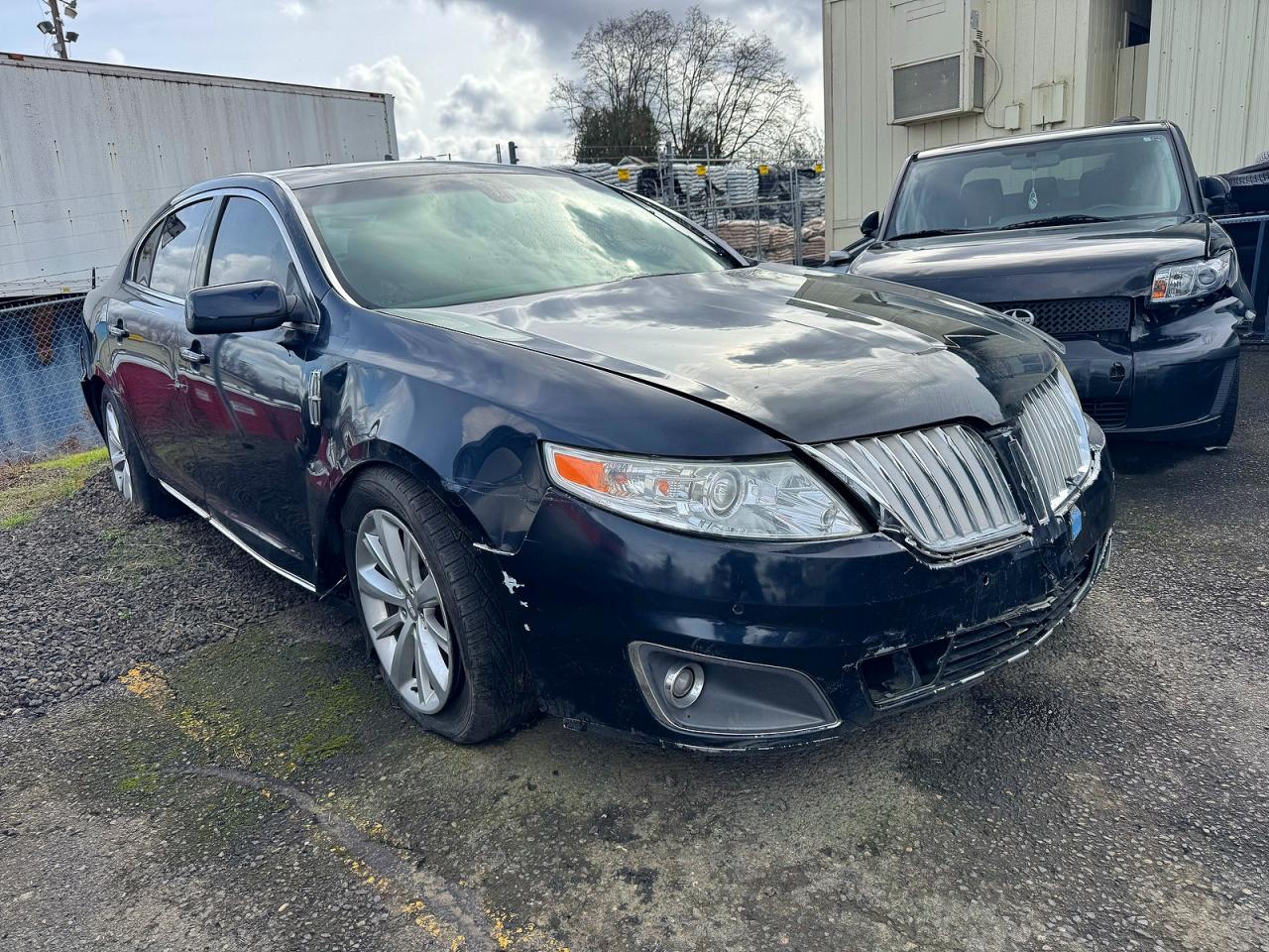 2009 Lincoln Mks VIN 1LNHM94RX9G608922 photo 1