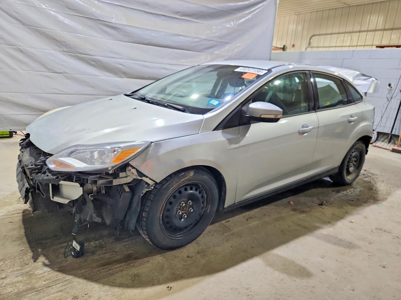 2012 Ford Focus VIN 1FAHP3F26CL299351 photo 1