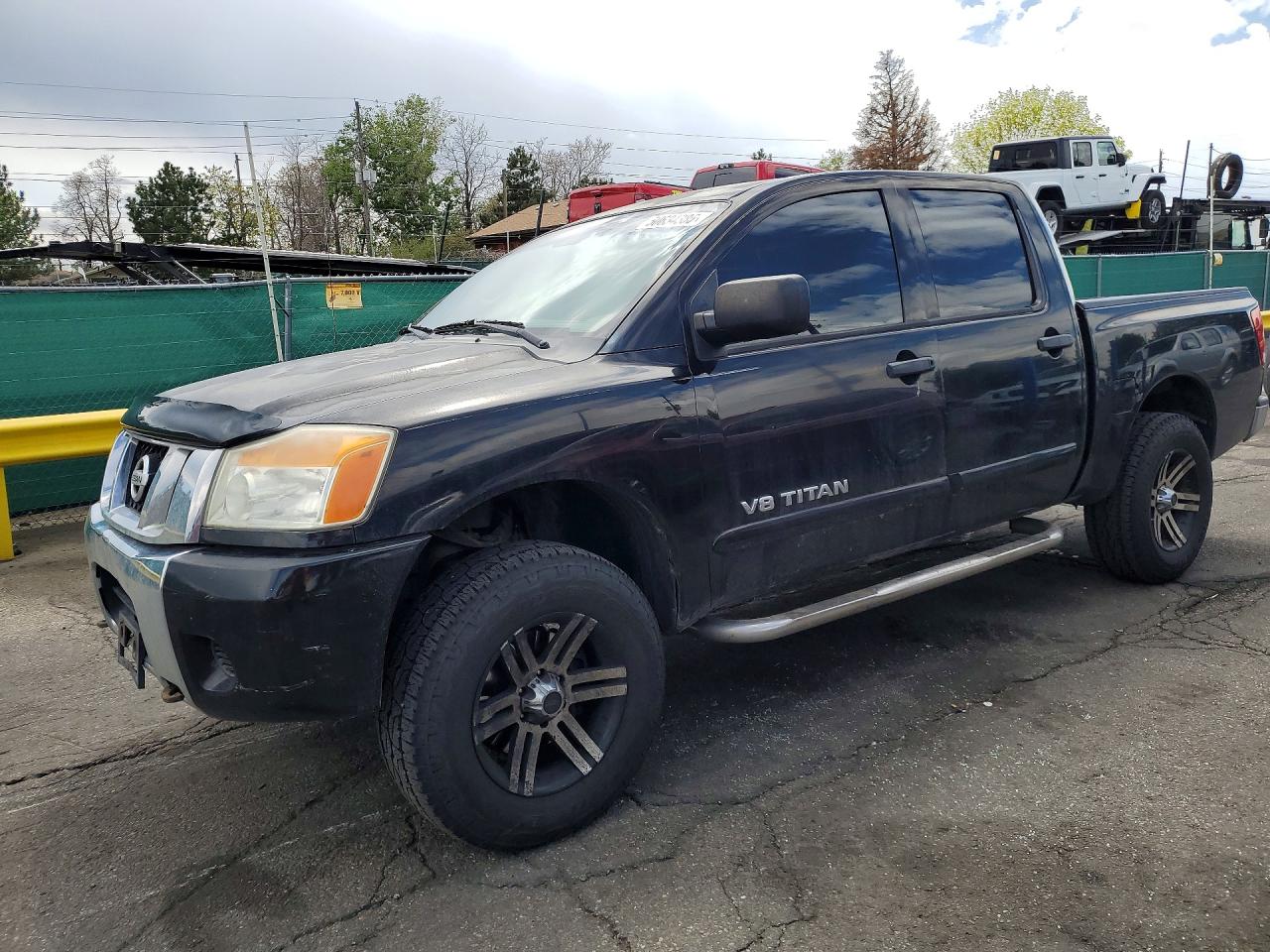 2012 Nissan TITAN VIN 1N6AA0EJ7CN310640 photo 1