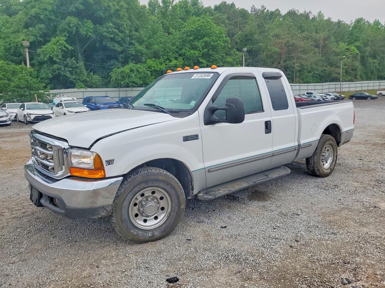 1999 Ford F250 VIN 1FTNX20F0XEA57460 photo 1