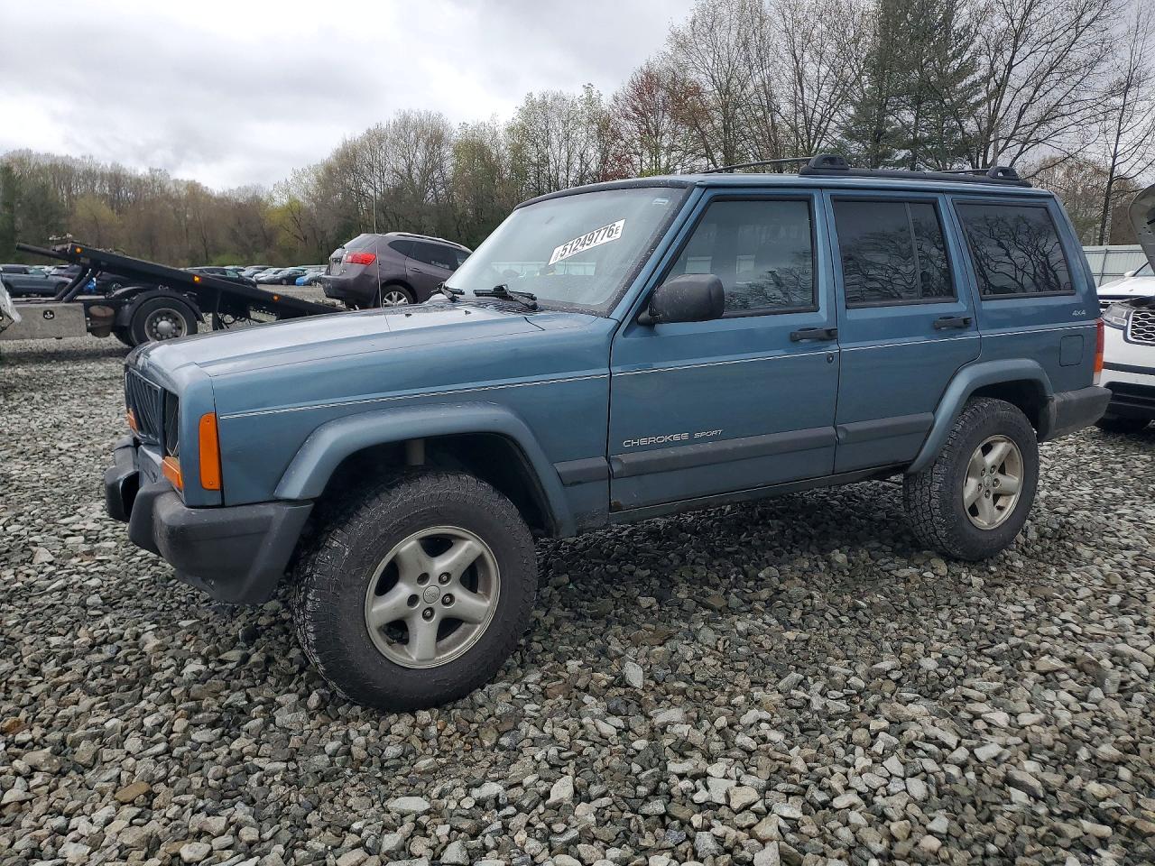 1999 Jeep Cherokee VIN 1J4FF68S7XL664008 photo 1