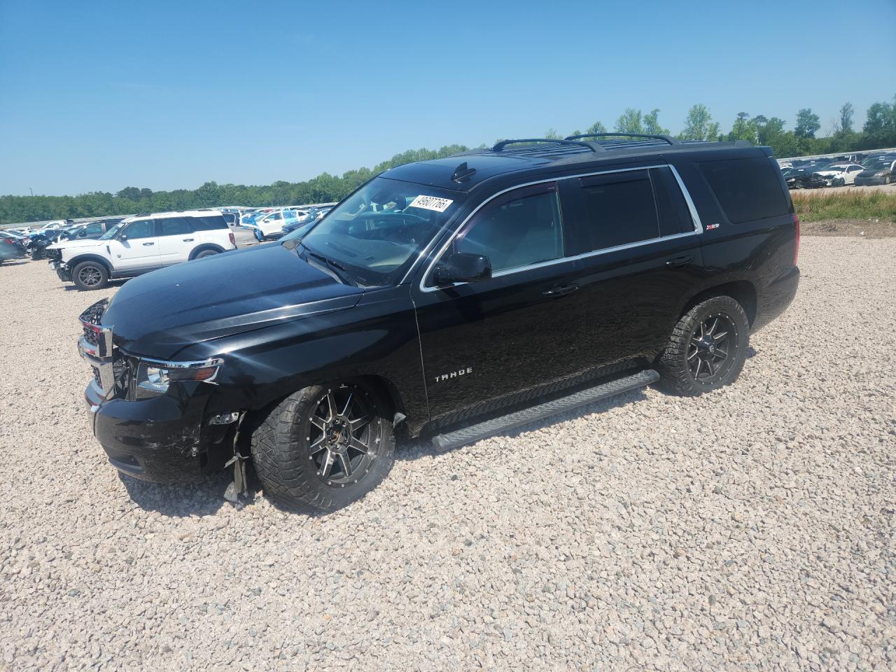 2018 Chevrolet Tahoe VIN 1GNSKBKC4JR278104 photo 1