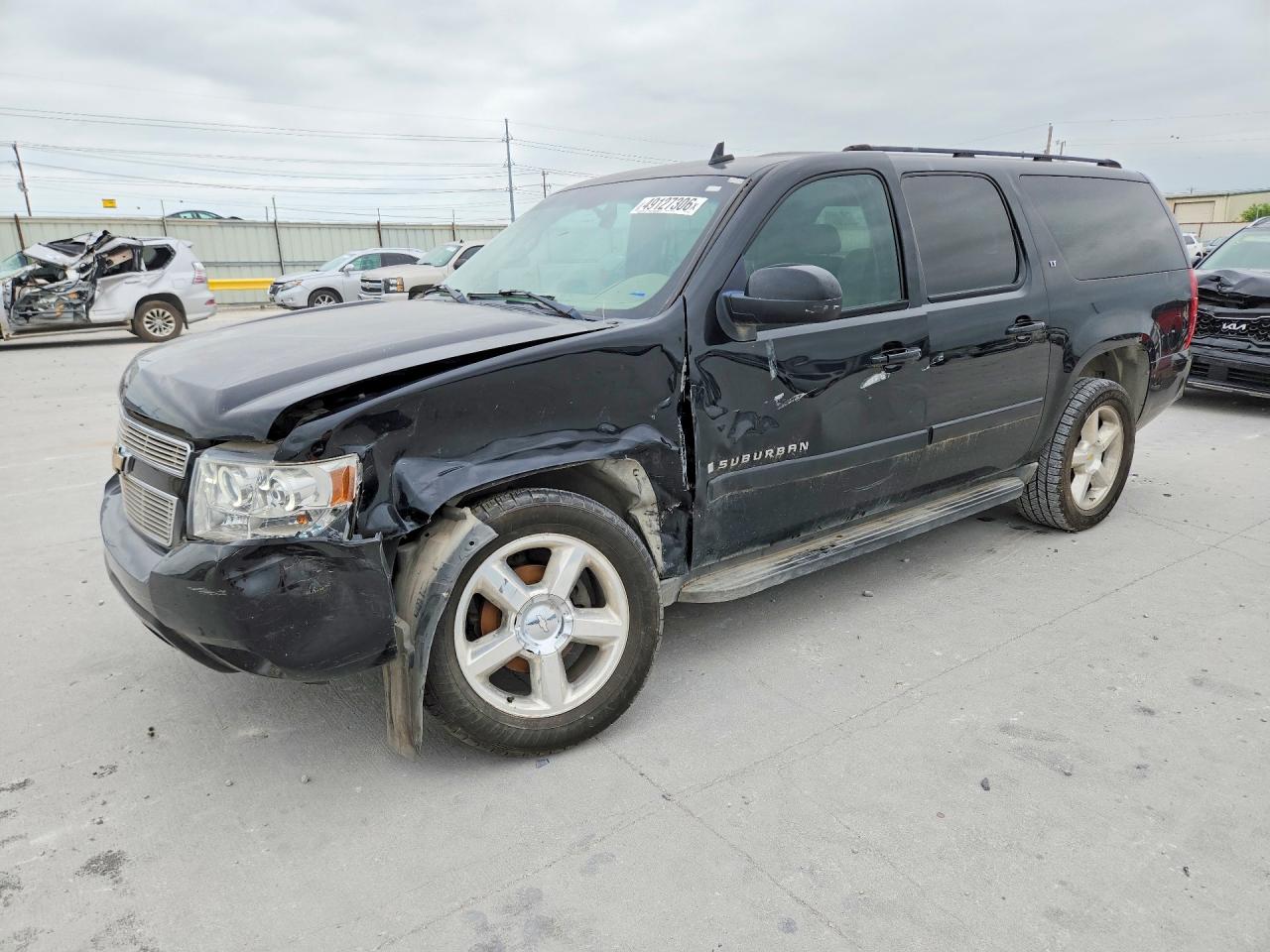 2007 Chevrolet Suburban VIN 3GNFC16027G138280 photo 1