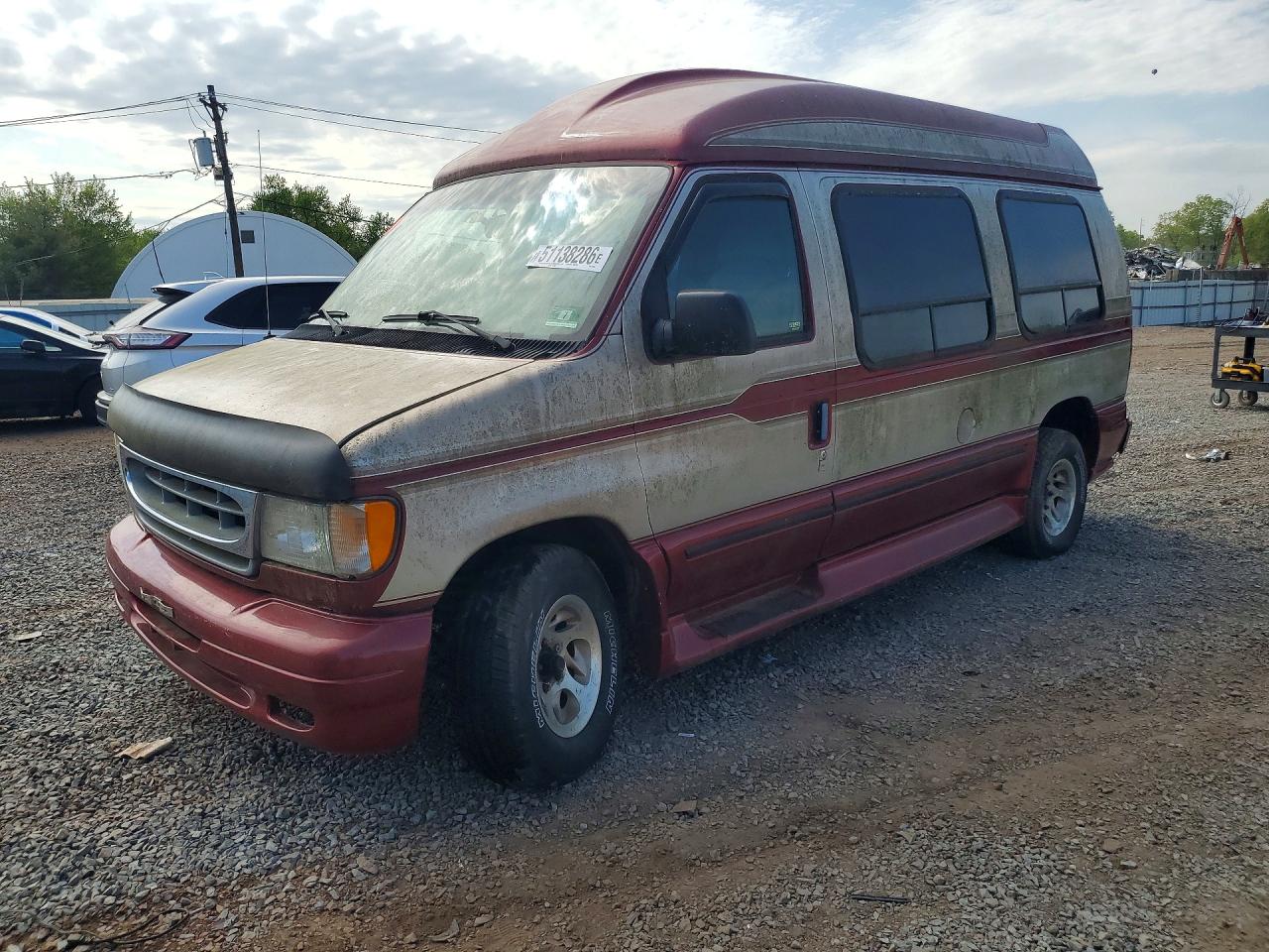 1999 Ford Econoline VIN 1FDRE14W0XHB73084 photo 1