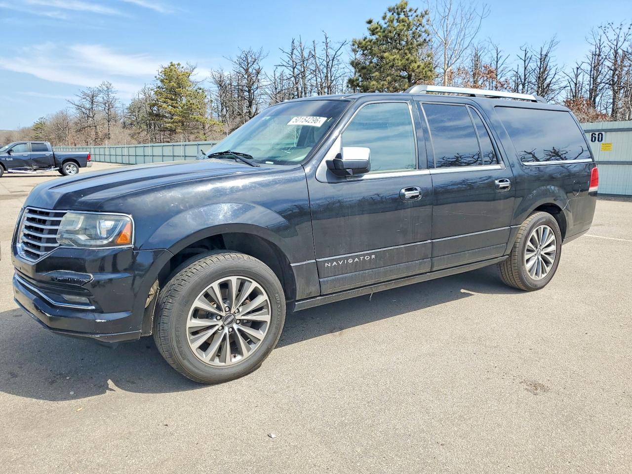 2017 Lincoln Navigator VIN 5LMJJ3HT9HEL03299 photo 1