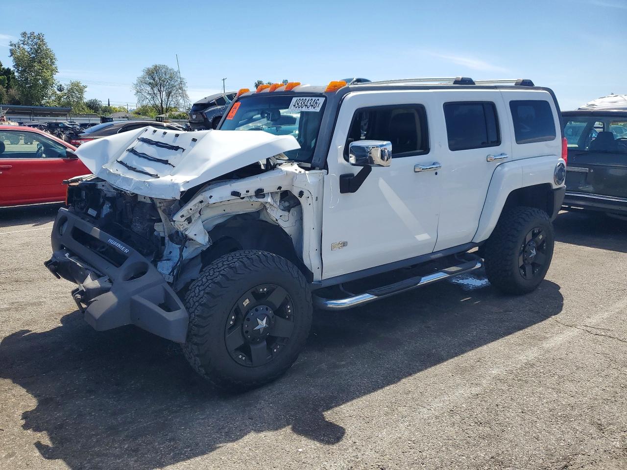 2006 Hummer H3 VIN 5GTDN136768330357 photo 1